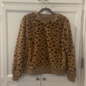 Faux fur sweatshirt.